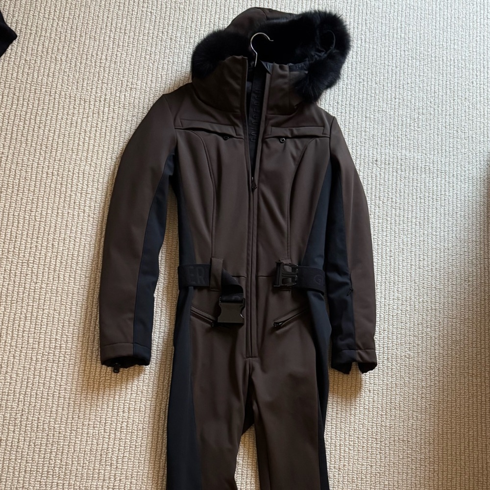 Brand new never worn brown ski suit with black faux fur